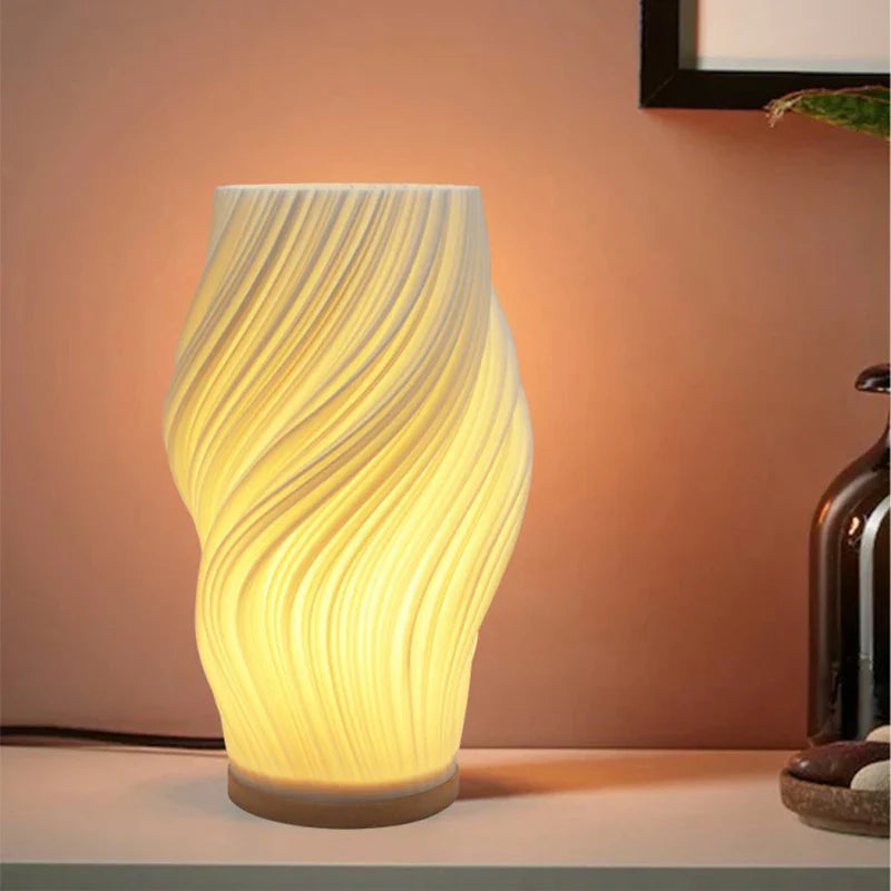 Designerska lampa stołowa LED o spiralnym kształcie