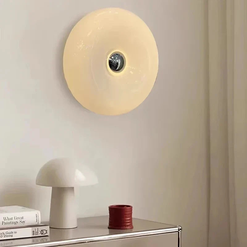 Lampa ścienna LED „donut” – designerska oprawa oświetleniowa z efektem świetlnej aureoli
